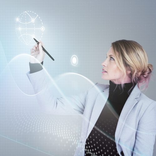 Businesswoman in a seminar drawing a graph