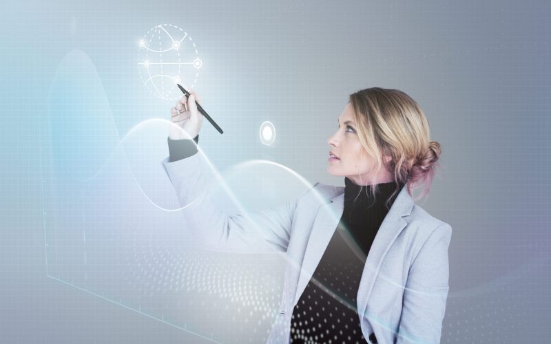 Businesswoman in a seminar drawing a graph
